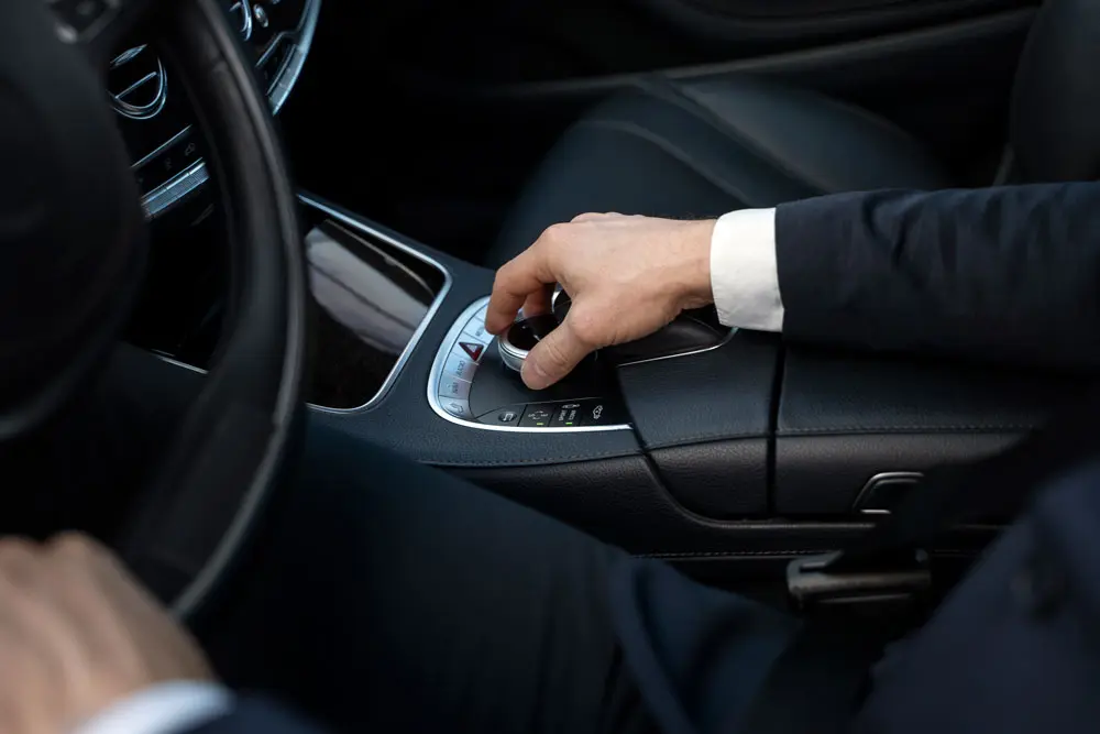 elegant uber driver giving taxi ride