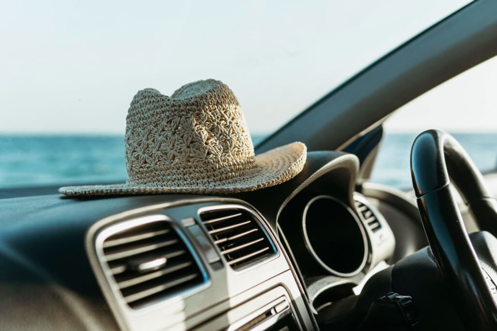 hat standing car board