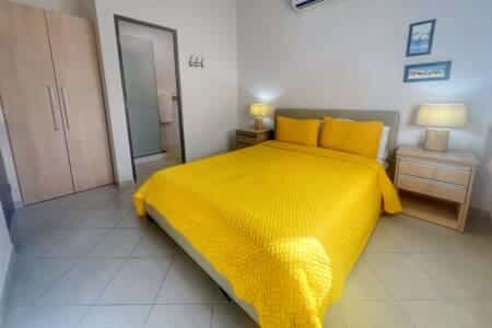 The primary bedroom has queen bed with ensuite bathroom, closet, Smart TV and safe.